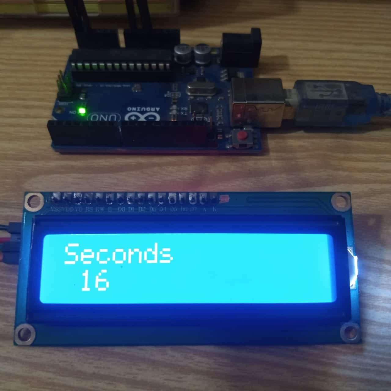 LCD Display and Arduino Uno: I2C Liquid Crystal wiring and code image.